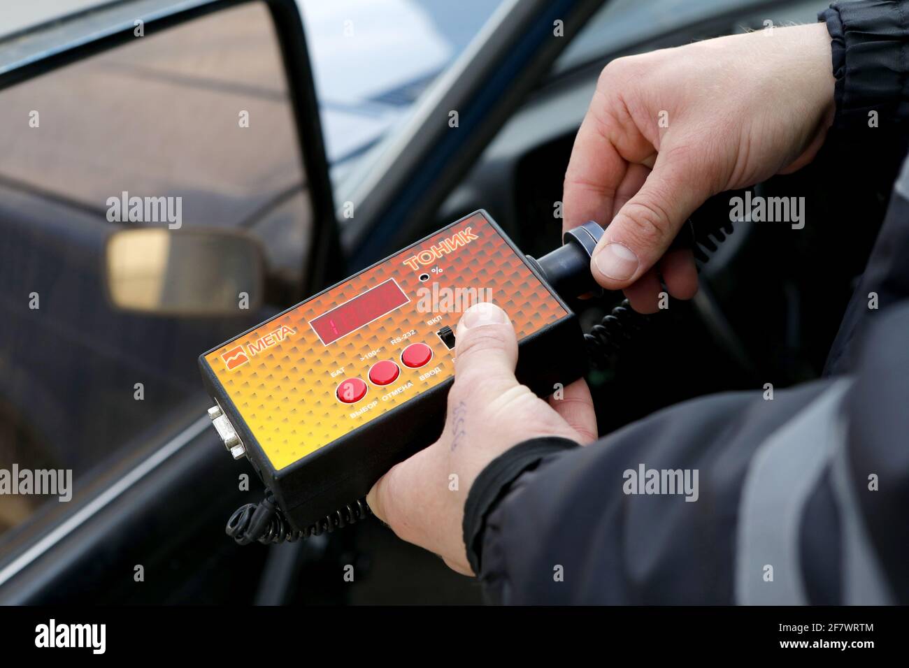 Belgorod Region Russia 9th Apr 2021 A Road Police Officer Checks The Transparency Of Car Windows During A Raid To Check For Compliance With Car Window Tinting Laws Credit Anton Vergun Tass Alamy Live