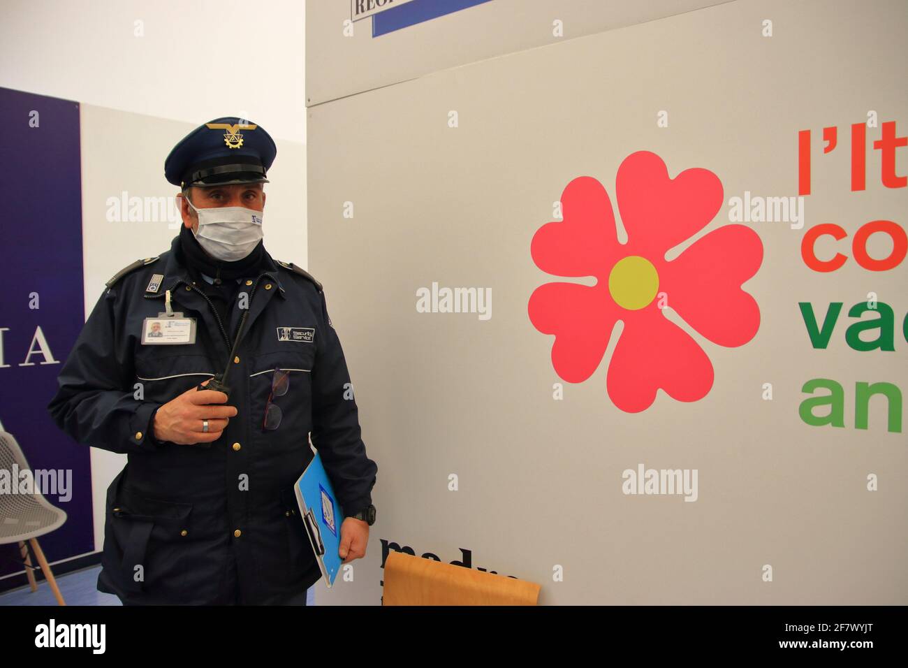 ivate police officers responsible for the safety of people outside and in the internal rooms of the Vaccination Center at the Mother Museum. Stock Photo