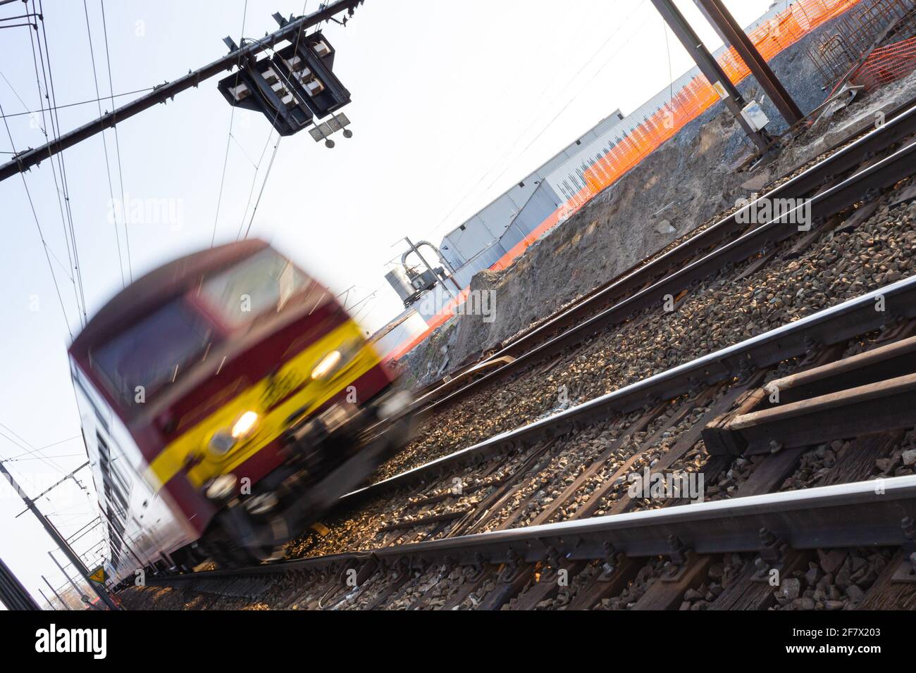 Intercity train passing by at high speed (Duffel, Belgium) Stock Photo