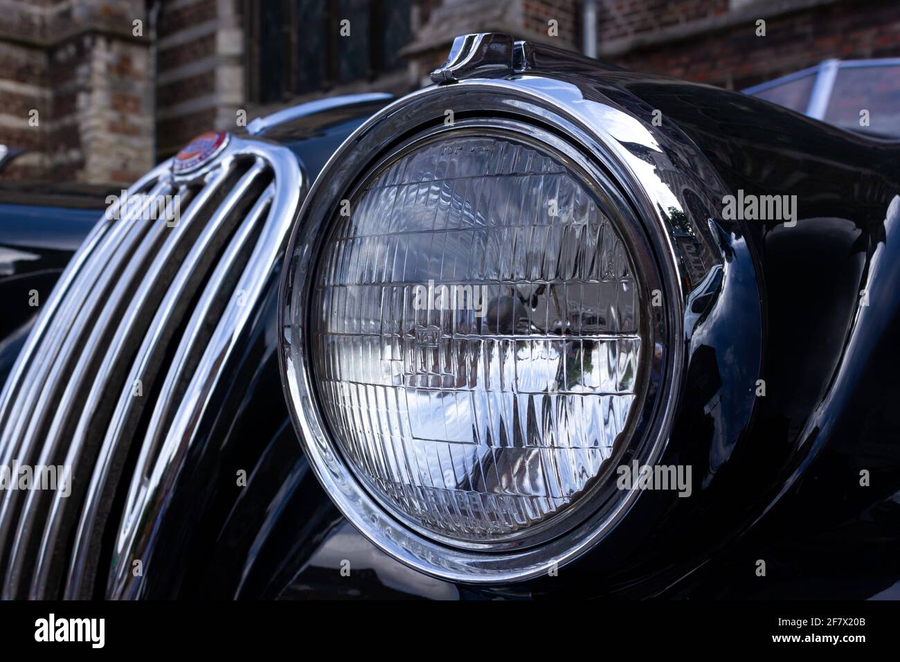 Jaguar XK140 headlight detail Stock Photo