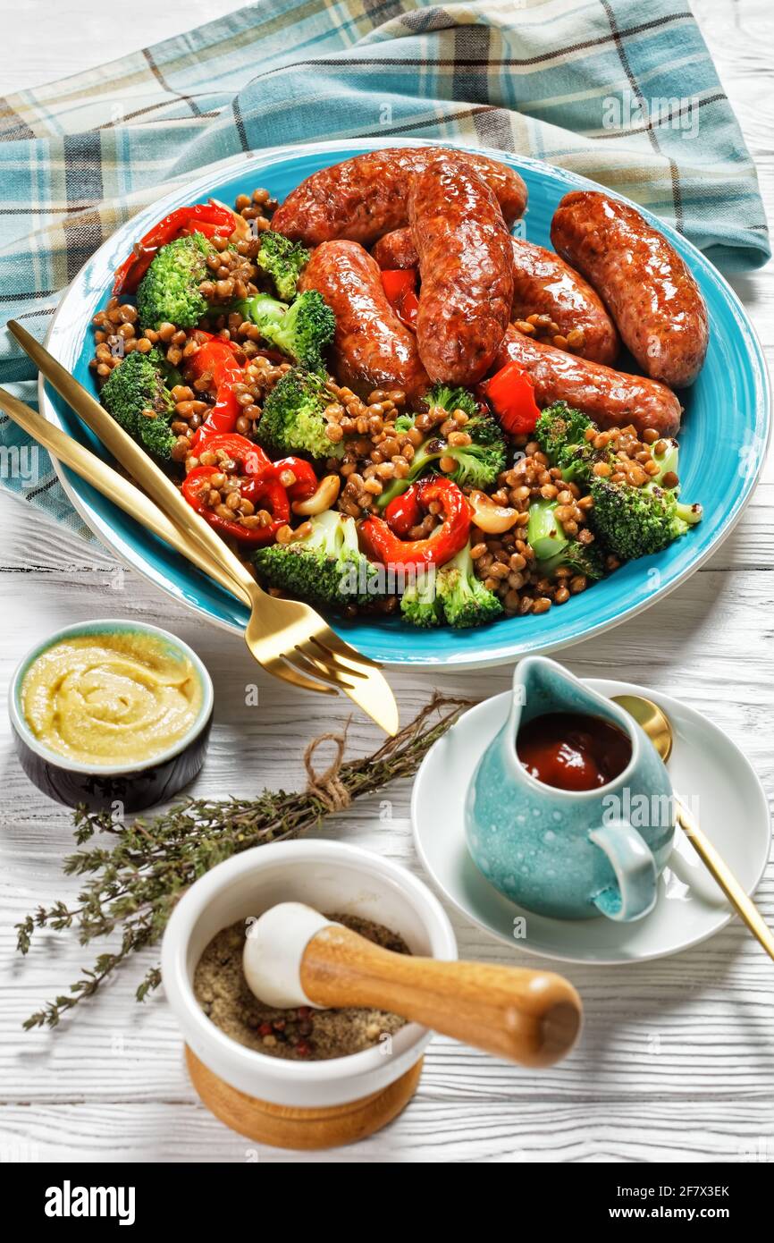 Italian pork sausages braised with brown lentils, red pepper, and