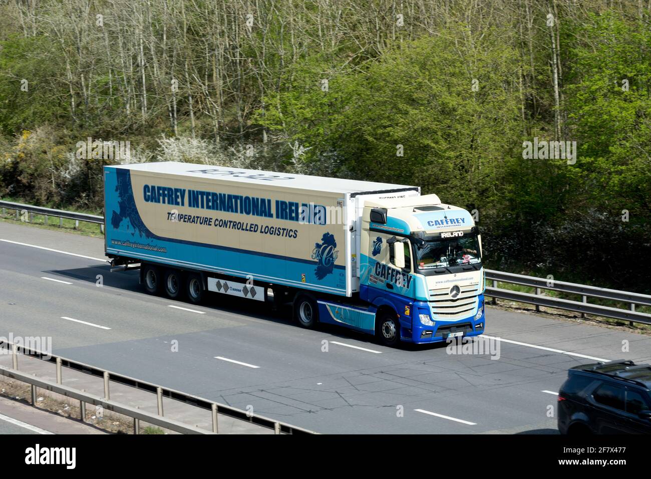 A Mercedes Caffrey International lorry on the M40 motorway, Warwickshire, UK Stock Photo