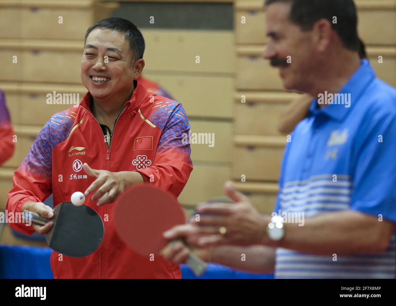 Beijing, USA. 17th Aug, 2019. Liu Guoliang (L), president of the Chinese Table  Tennis Association, serves the ball during a joint training session between  the Chinese and U.S. national table tennis teams