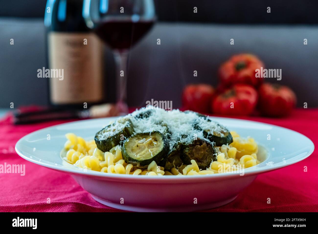 Pasta with zucchini on an italian table Stock Photo