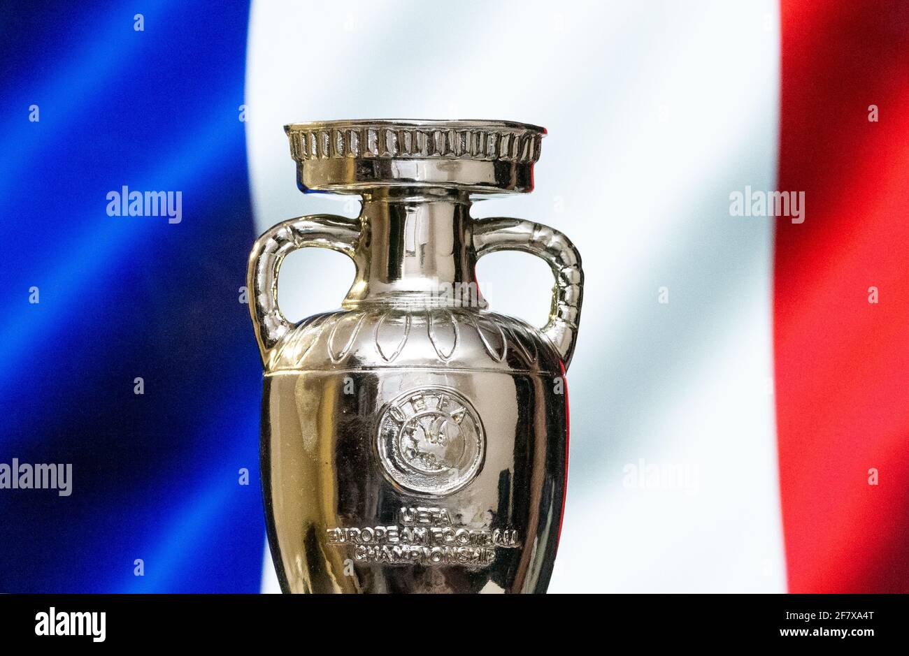 April 10, 2021. Paris, France. UEFA European Championship Cup with the  French flag in the background Stock Photo - Alamy