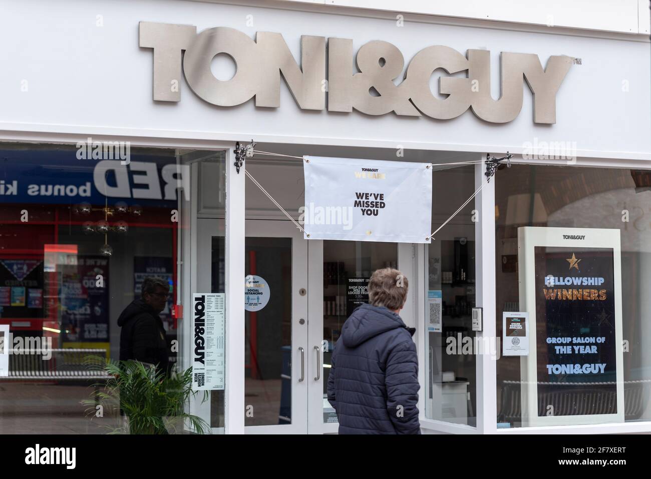 Toni & Guy hair salon in the High Street of Southend on Sea, Essex, UK, with a sign welcoming back customers on 12 April after COVID 19 lockdown Stock Photo