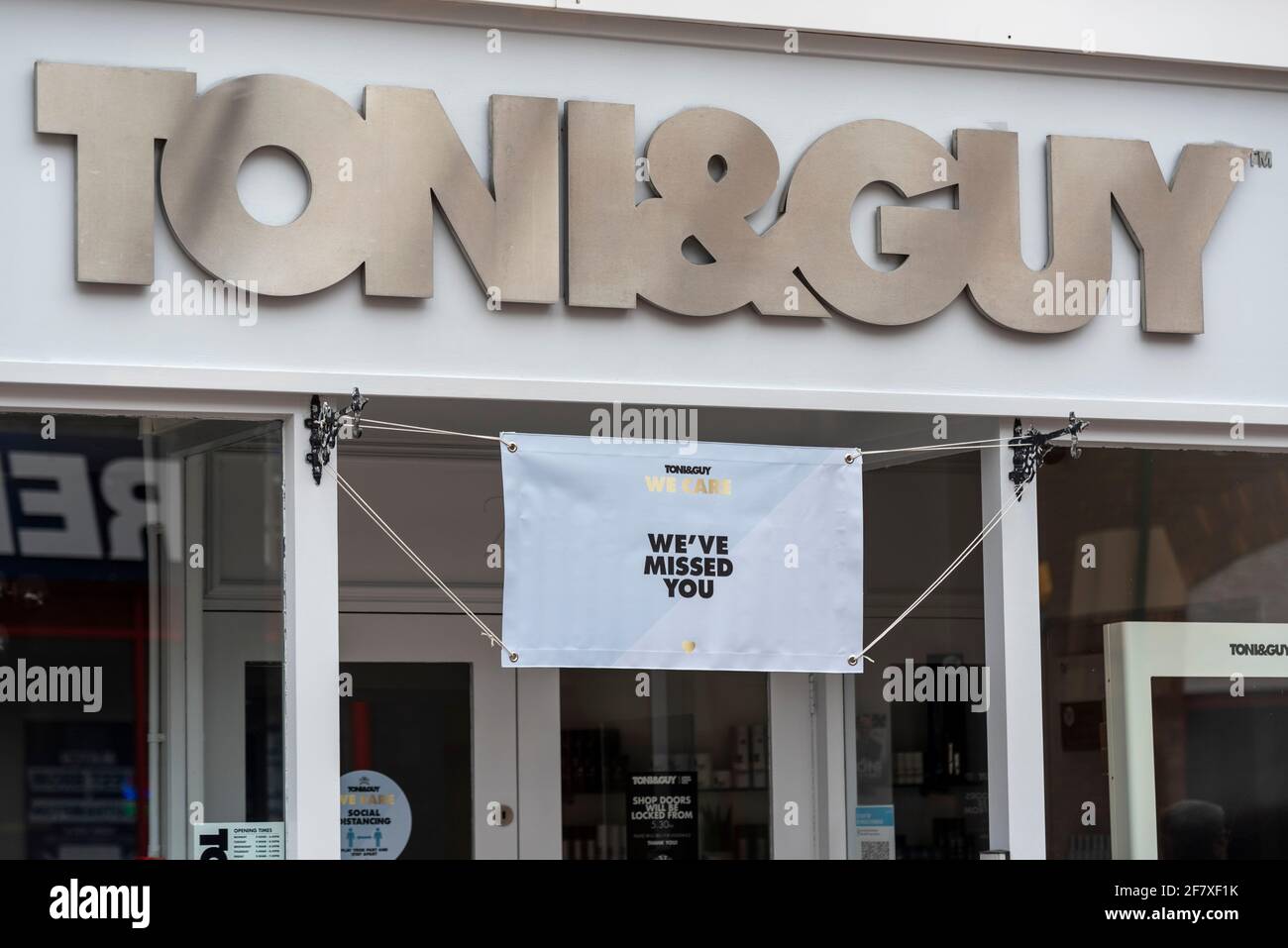 Toni & Guy hair salon in the High Street of Southend on Sea, Essex, UK, with a sign welcoming back customers on 12 April after COVID 19 lockdown Stock Photo