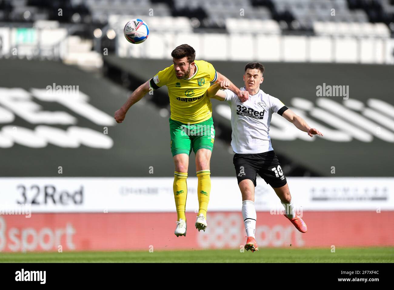 DERBY, ENGLAND. APRIL 10TH: Grant Hanley of Norwich City battles with Tom Lawrence of Derby County during the Sky Bet Championship match between Derby County and Norwich City at the Pride Park, Derby on Saturday 10th April 2021. (Credit: Jon Hobley | MI News) Credit: MI News & Sport /Alamy Live News Stock Photo