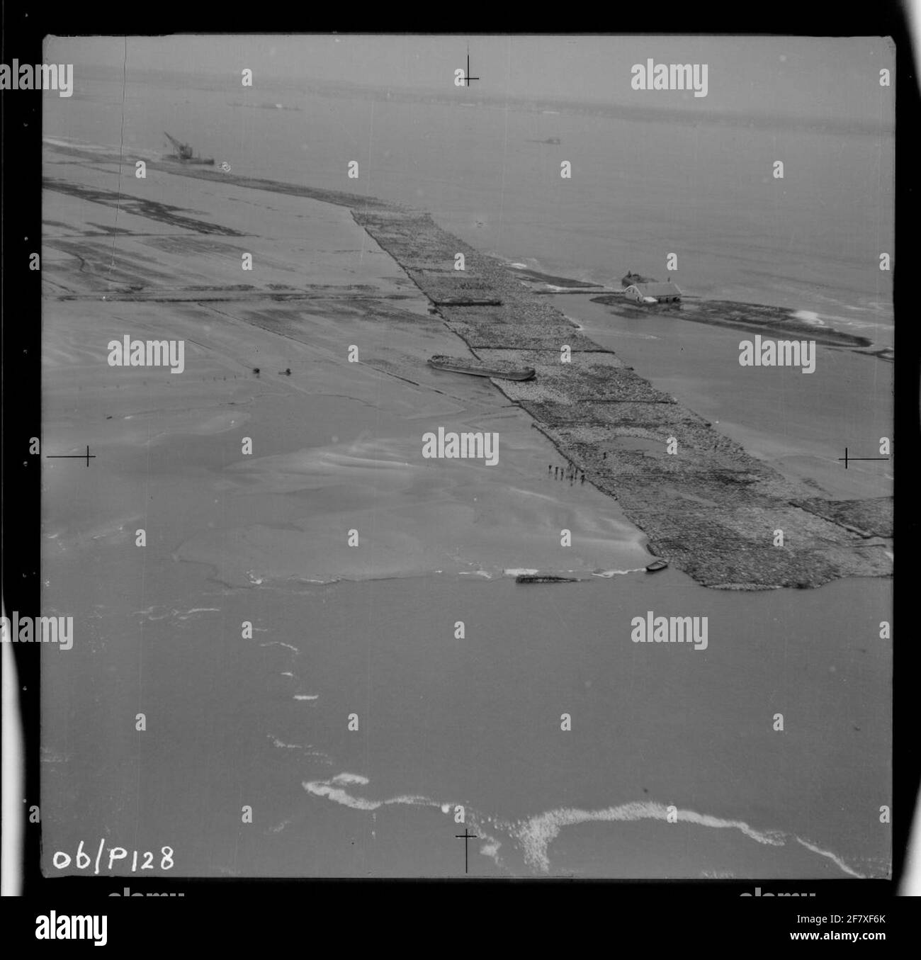 Water release disaster 1953. Air photo of Schelphoek and an overview of the area affected by the disaster. Work on an embankment to be applied. Stock Photo