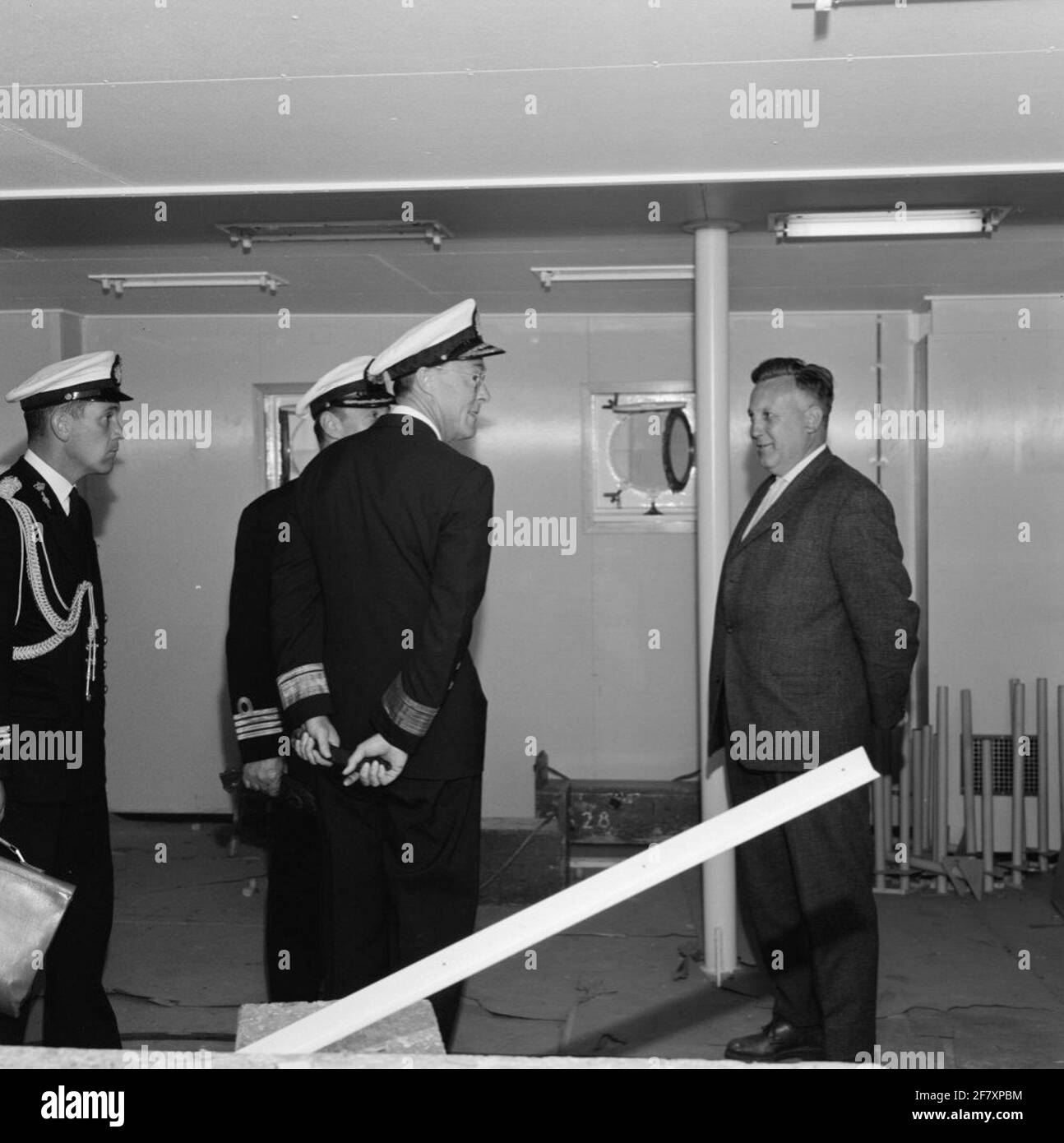 Prince Bernhard, in his position as Inspector General of the Armed Forces (IGK) and in the Uniform of Lieutenant Admiral (LTADM), visit the Rotterdamsche Droogdok Maatschappij (RDM) at the Heijplaat in Rotterdam. The seven provinces (Zipprov) (C 802) and the pool star (A 835), the supply ship for the Royal Netherlands Marine (KM), which after the commissioning as Harer Majesteits (Hr.Ms.) will go into the pool star. On board the pool star. Stock Photo