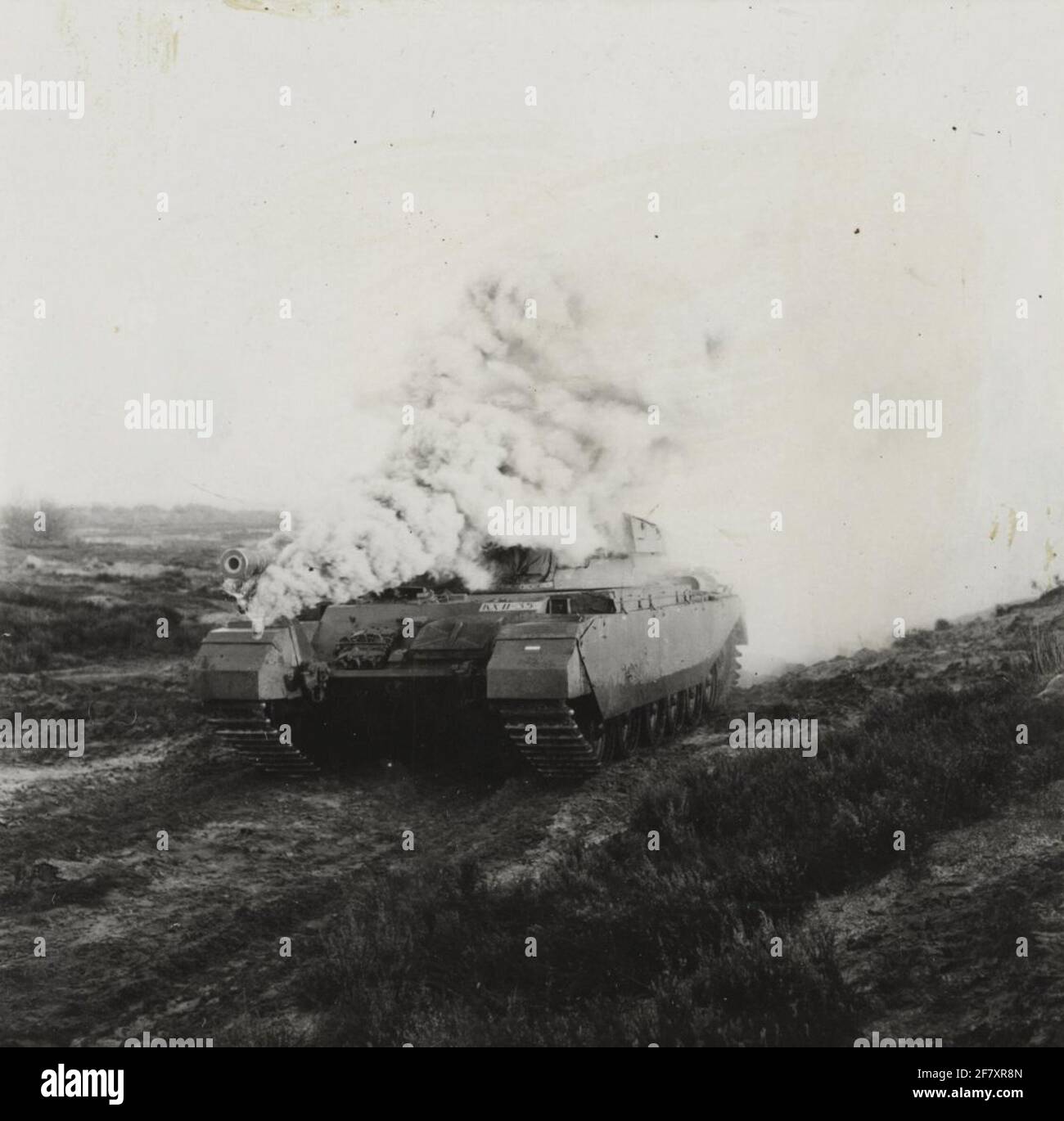 In the so-called 'tank nabrigation' a combat tank of the Centurion MK 3  type with smoke and jumping means is disappointed Stock Photo - Alamy
