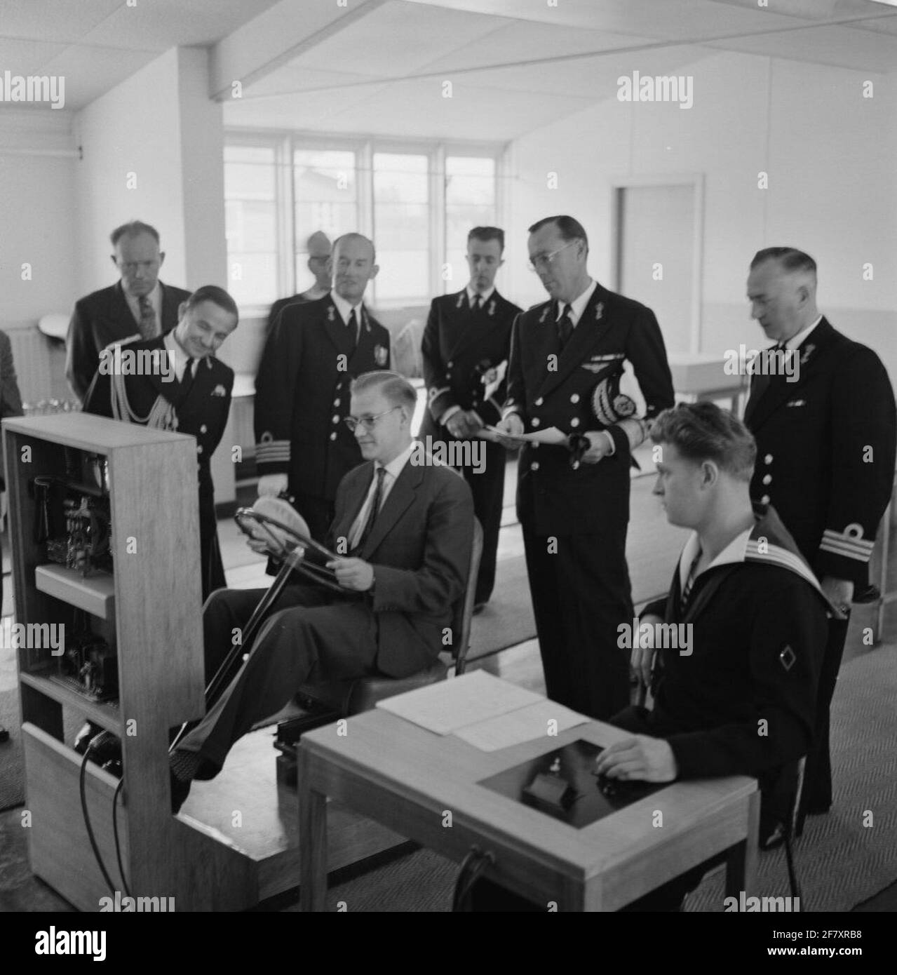 Working visit (in his capacity as Inspector General of the Royal Netherlands) of ZKH Prins Bernhard (1911-2004, third from the right) at the Marine Opinion Center (MOC) in Voorschoten, 1957. Stock Photo