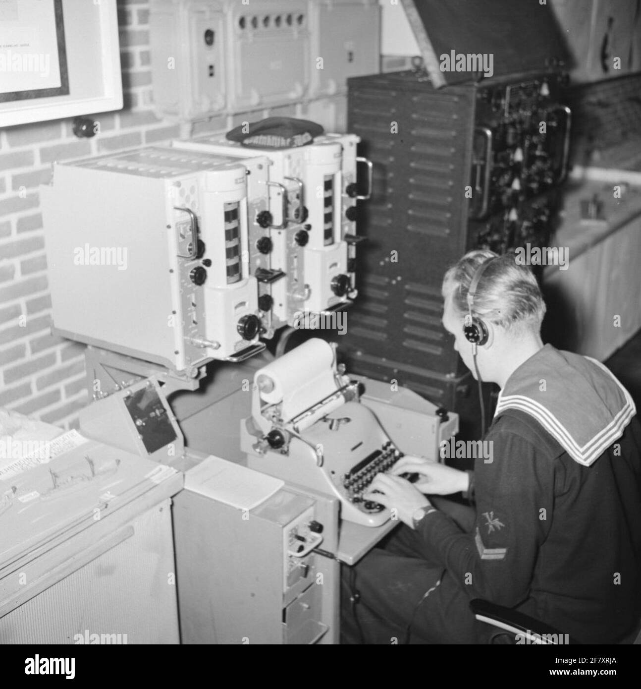 Work intake of a corporal telegraphist at a walening. Is part of the AVDKM 540718 to 540719 object series. Stock Photo