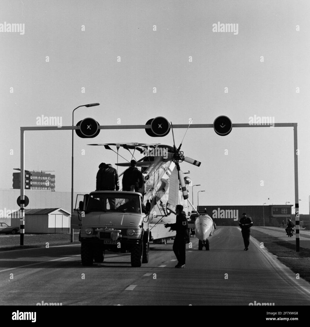 Transport of a Canadian saking helicopter to the MarineLiegkamp de Kooy in Den Helder. Stock Photo