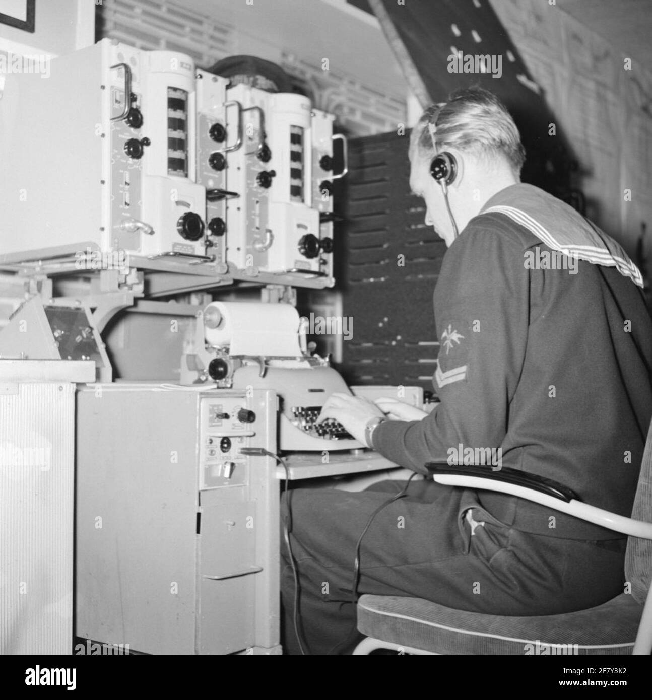 Work intake of a corporal telegraphist at a walening. Is part of the AVDKM 540718 to 540719 object series. Stock Photo