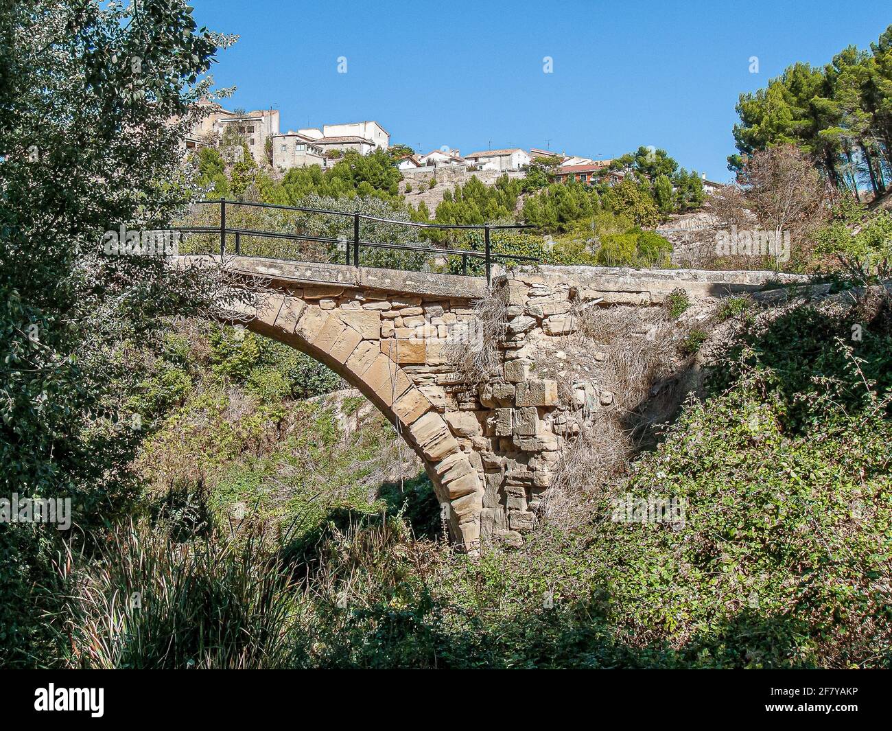 Medieval bridge over the deep ravine of Rio Linares at Torres del Rio, Spain, October, 17, 2009 Stock Photo
