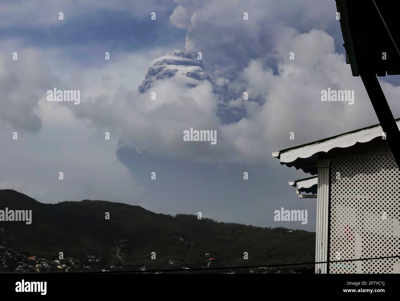 Ash plume from the second explosive eruption of La Soufrière volcano on St Vincent, April 9th 2021, seen from nearby Bequia island - looking like rock Stock Photo