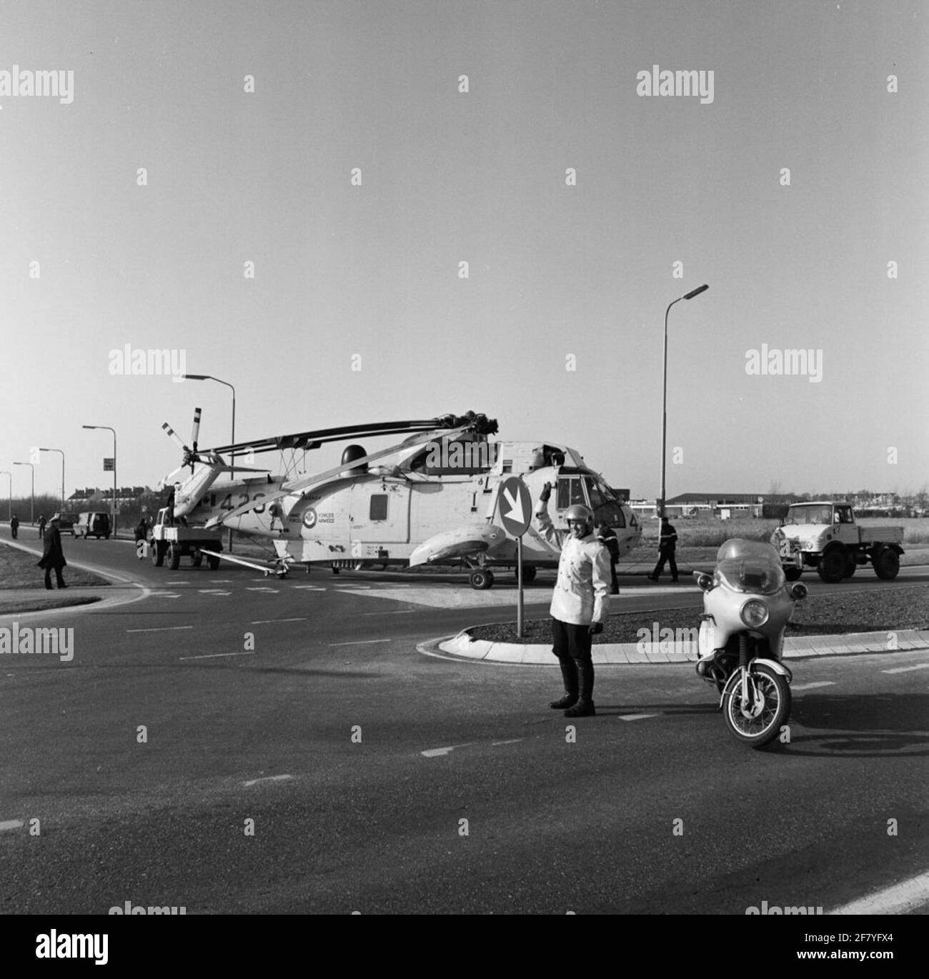 Transport of a Canadian saking helicopter to the MarineLiegkamp de Kooy in Den Helder. Stock Photo