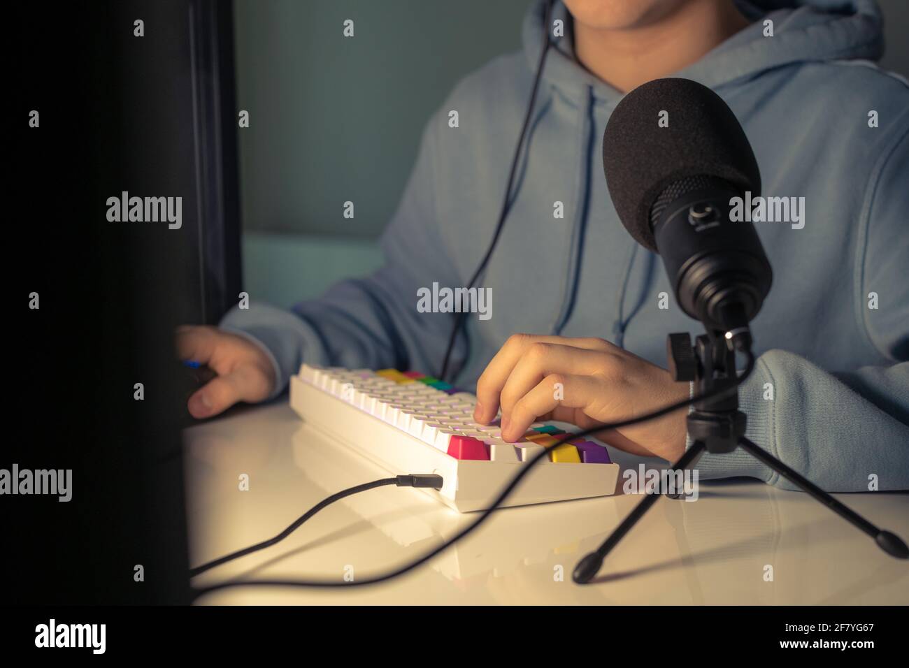 Video game streamers playing on their home console. Teenager playing