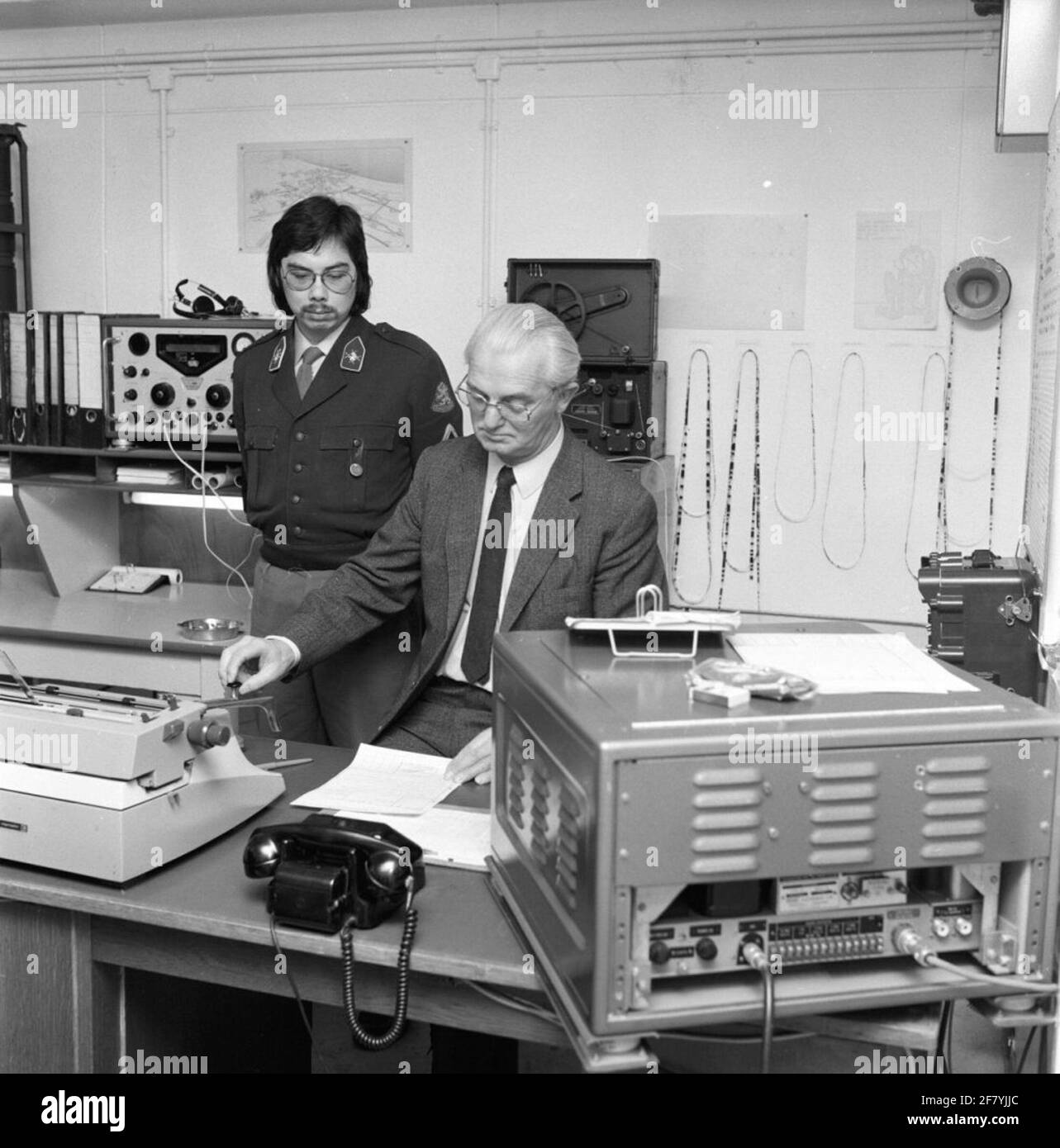 Shipping from the last telegram to the force in Suriname by the Chef Radiokamer, Mr Hulsebosch, from the radio room in the bunker at the Princess Julianakanne. Stock Photo