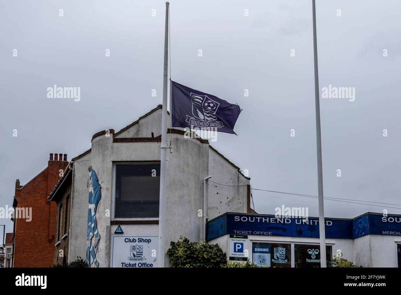 Southend United Football Club flag flying at half mast following death of Prince Philip, Duke of Edinburgh outside Roots Hall football ground entrance Stock Photo