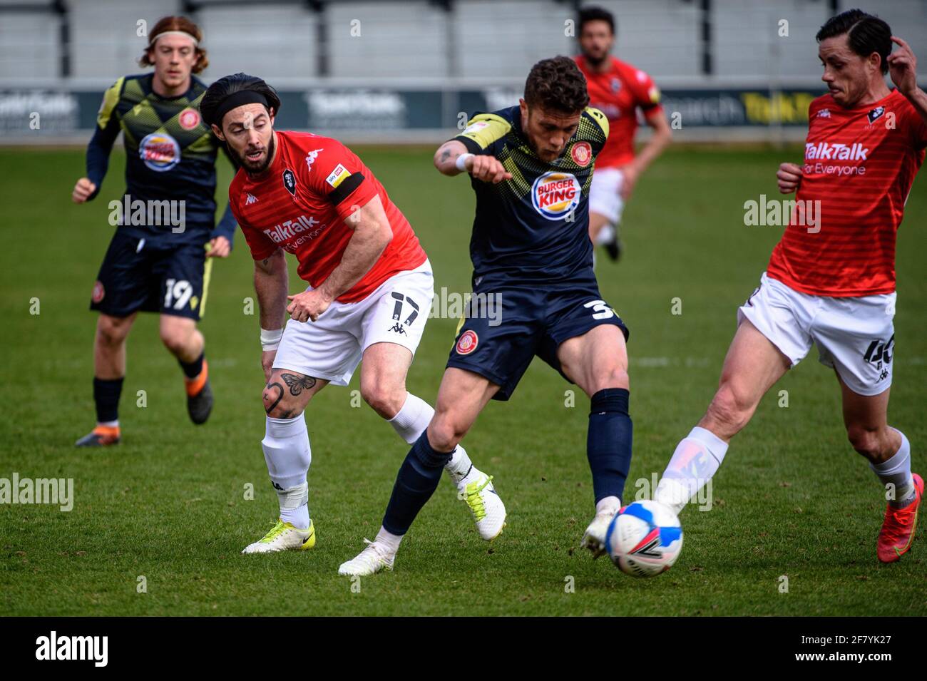 SALFORD, UK. APRIL 10TH: Ben Coker of Stevenage FC tackles Richie Towell of Salford City FC during the Sky Bet League 2 match between Salford City and Stevenage at Moor Lane, Salford on Saturday 10th April 2021. (Credit: Ian Charles | MI News) Credit: MI News & Sport /Alamy Live News Stock Photo