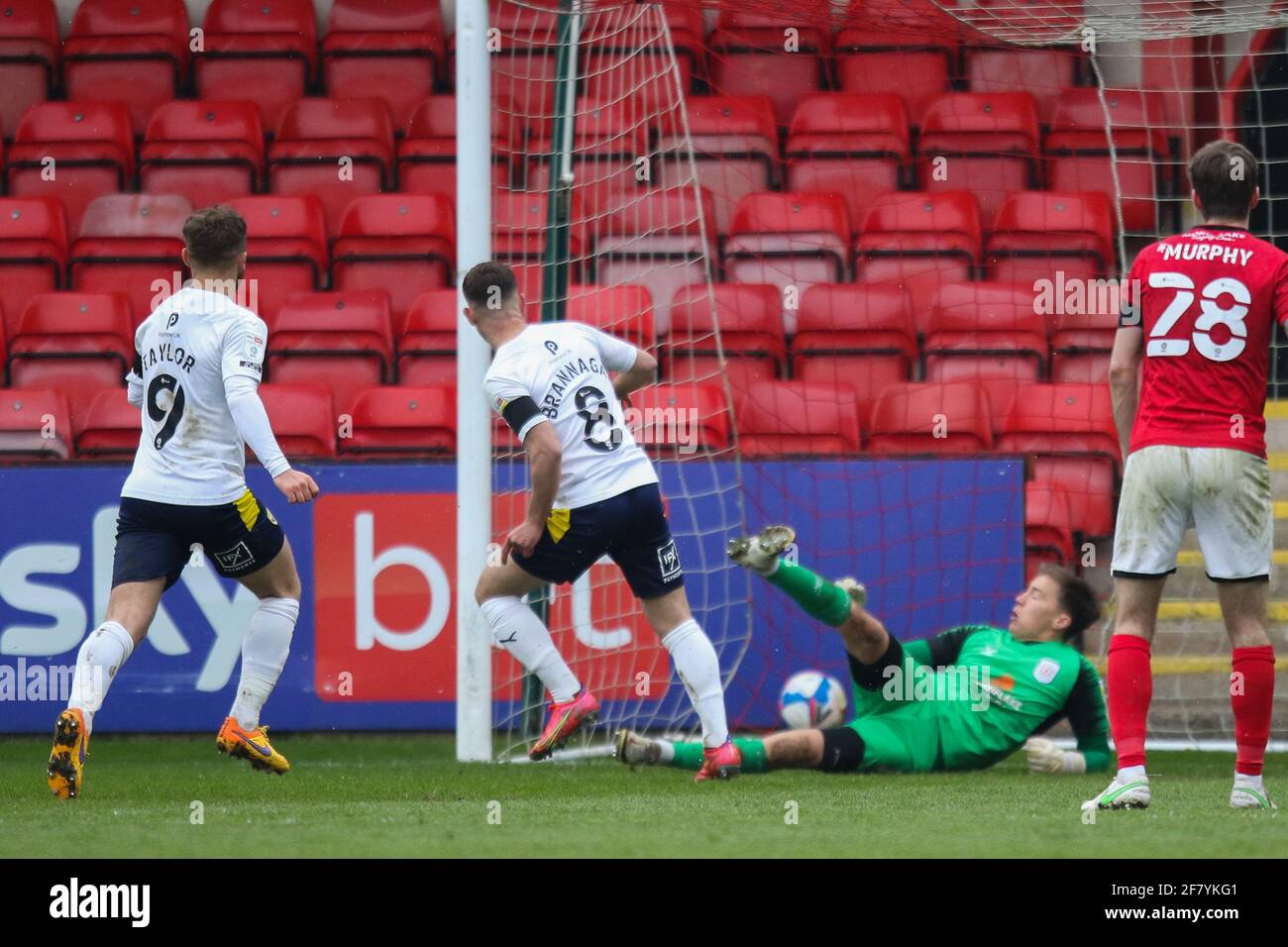 Crewe, UK. 10th Apr, 2021. Crewe Alexandra goalkeeper Will Jaaskelainen (1) saves a penalty from Oxford United midfielder Cameron Brannagan (8) but is unable to stop the midfielder's second attempt during the EFL Sky Bet League 1 match between Crewe Alexandra and Oxford United at Alexandra Stadium, Crewe, England on 10 April 2021. Photo by Jurek Biegus. Editorial use only, license required for commercial use. No use in betting, games or a single club/league/player publications. Credit: UK Sports Pics Ltd/Alamy Live News Stock Photo