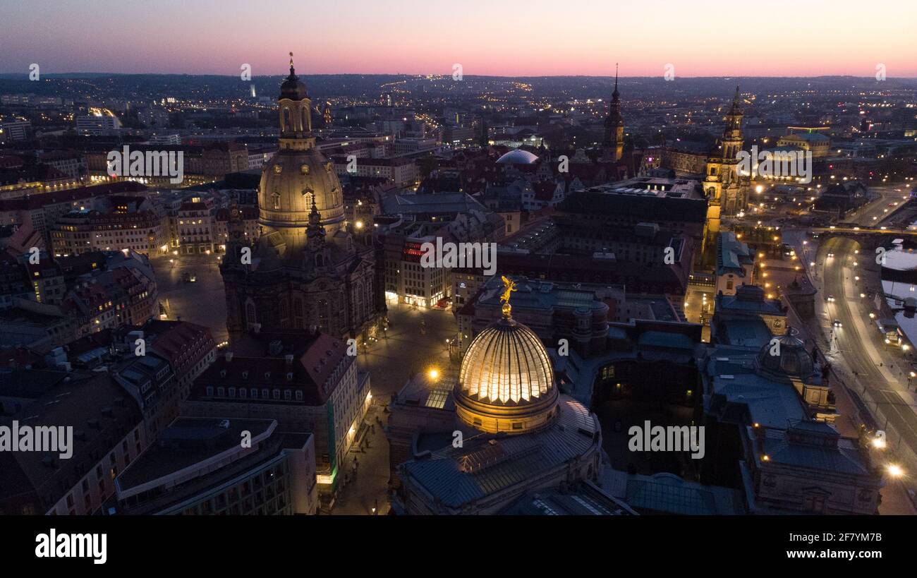 Beautiful scenery of a cityscape with illuminated buildings in Dresden ...
