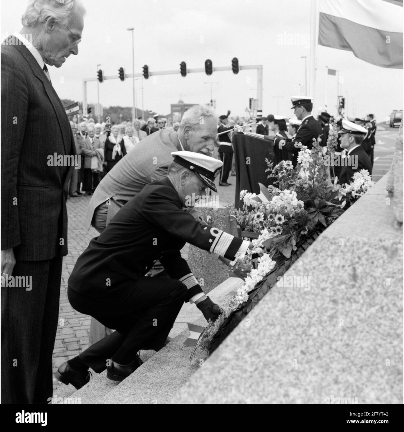 Remembrance and wreaths on Havenplein in Den Helder in May 1990. Provide the commander of naval power (CZM) in the Netherlands Vice-Admiraal J.D.W. Van Renesse (1934). Stock Photo