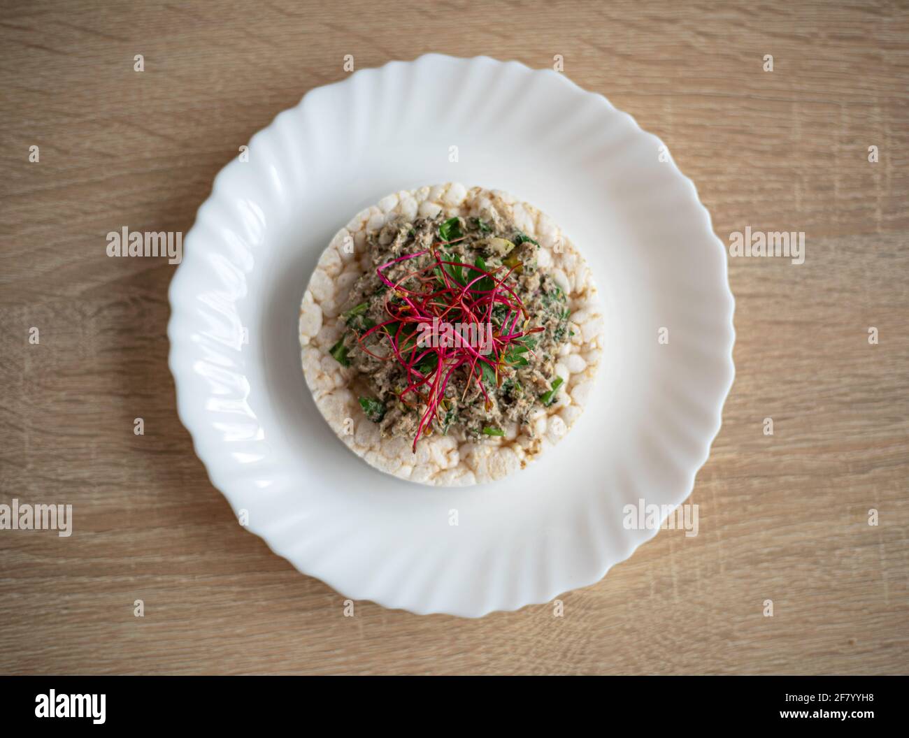 Healthy, tasty sandwich with rice waffle, fish paste, avocado and ...