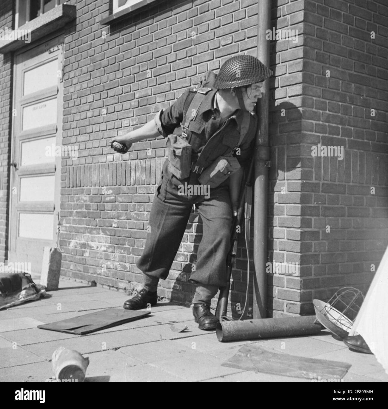 An infanterist ready to throw a practice hand grenade. Stock Photo