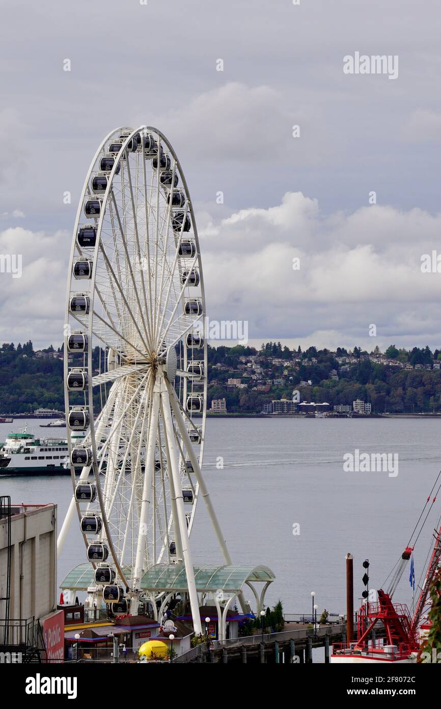 The Great Wheel at Pier 57 of Seattle, Washington, USA, under cloudy sky. Stock Photo