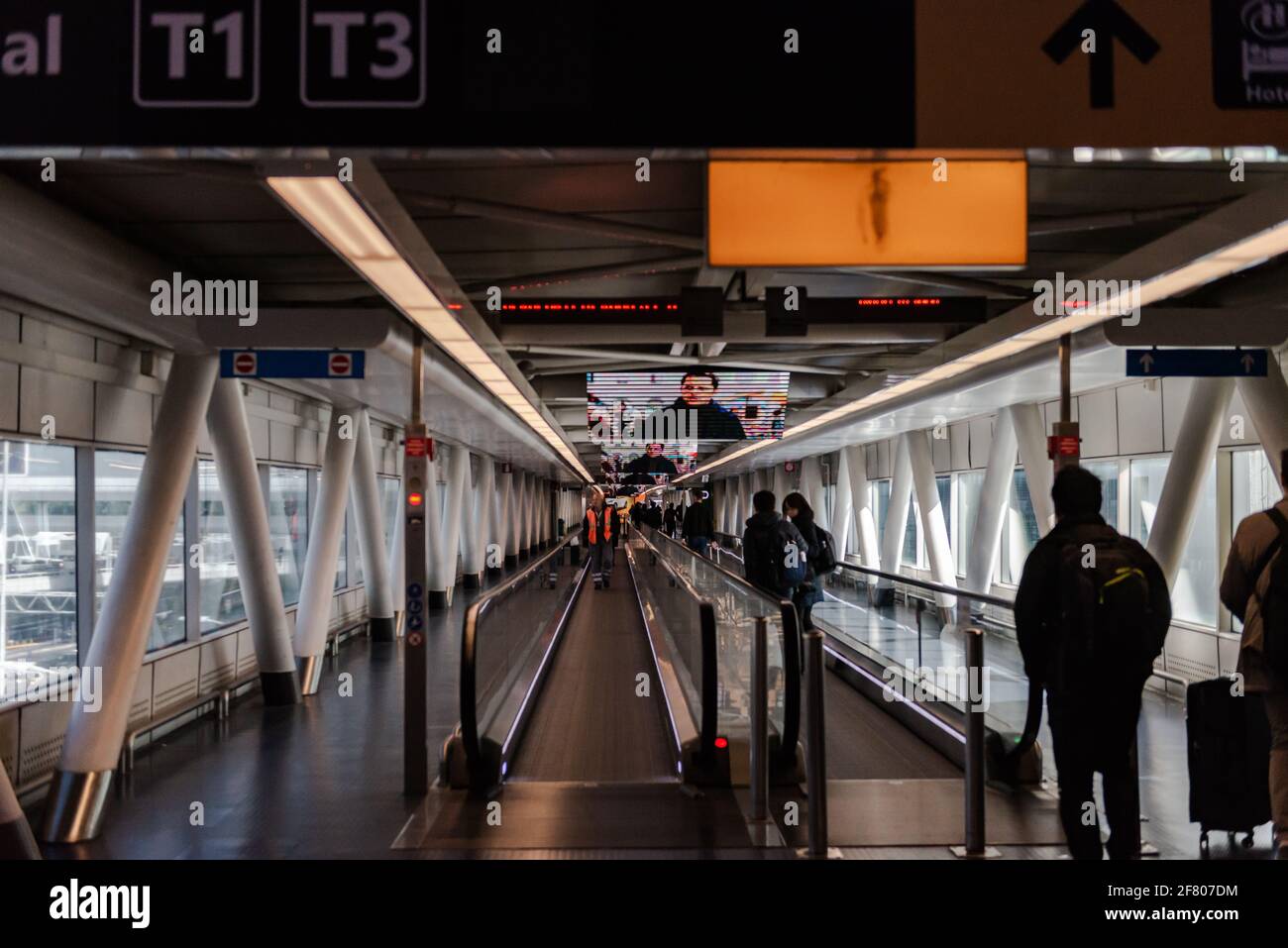 Rome, Italy. Spring 2020. Elevated walkway from the train station to Rome Airport. Travelators in the long passages of the Italian airport. Stock Photo