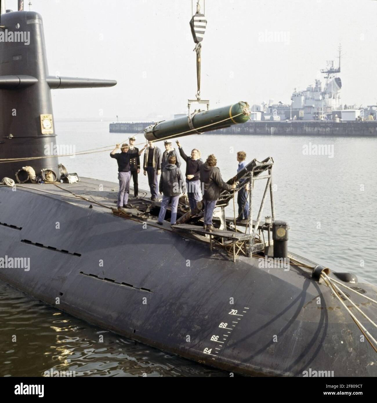 The submarine Hr.Ms. Swordfish (1972-1994) When boarding torpedoes on board. Stock Photo