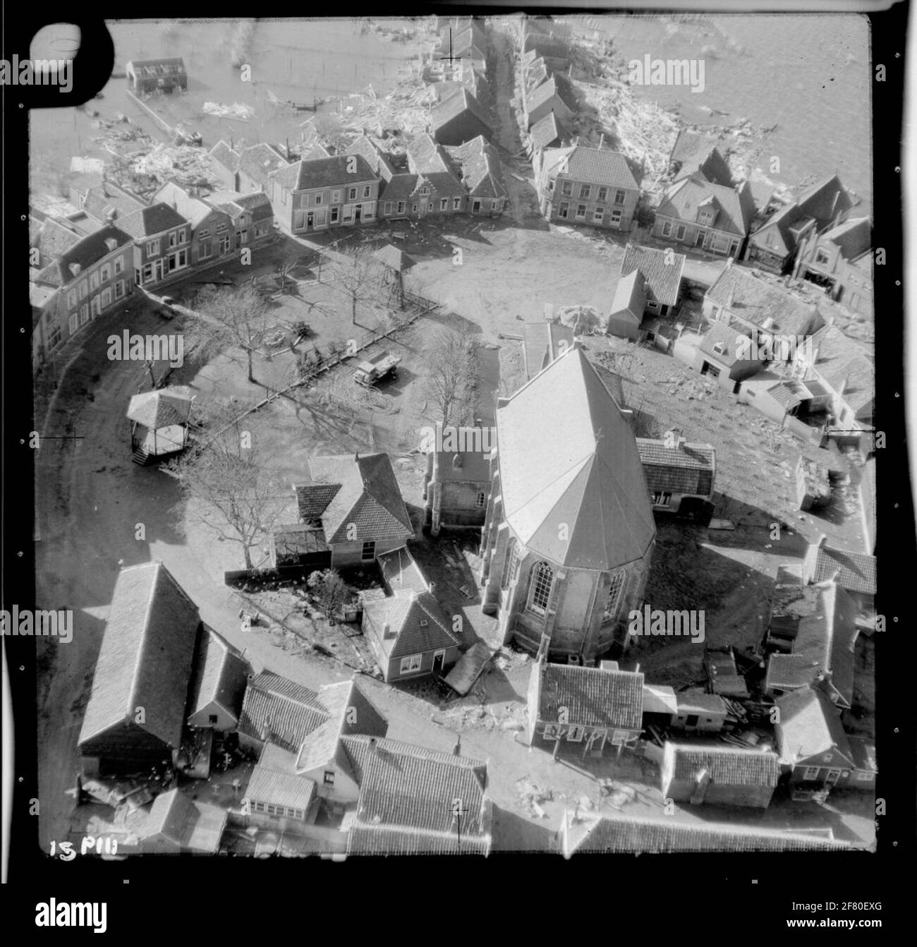 Water-shortage disaster 1953. Air photo of Nieuwerkerk with an overview of the area affected by the disaster. Midden de Johanneskerk (the tower was blown up by the Germans in 1945). Stock Photo