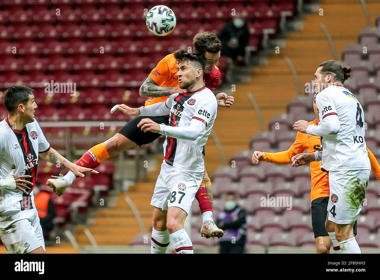 ISTANBUL, NETHERLANDS - APRIL 10: Ogulcan Caglayan of Galatasaray, Ervin Zukanovic of Fatih Karagumruk during the Super lig match between Galatasaray Stock Photo