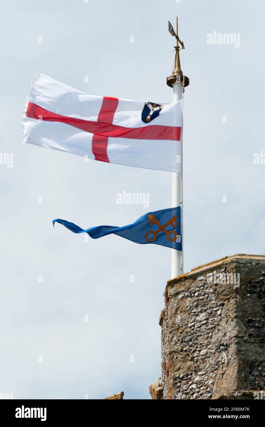 Flying the White Ensign from the tower of St Peter in Thanet dates back to the use of the tower as a signalling station during the Napoleonic Wars. Stock Photo