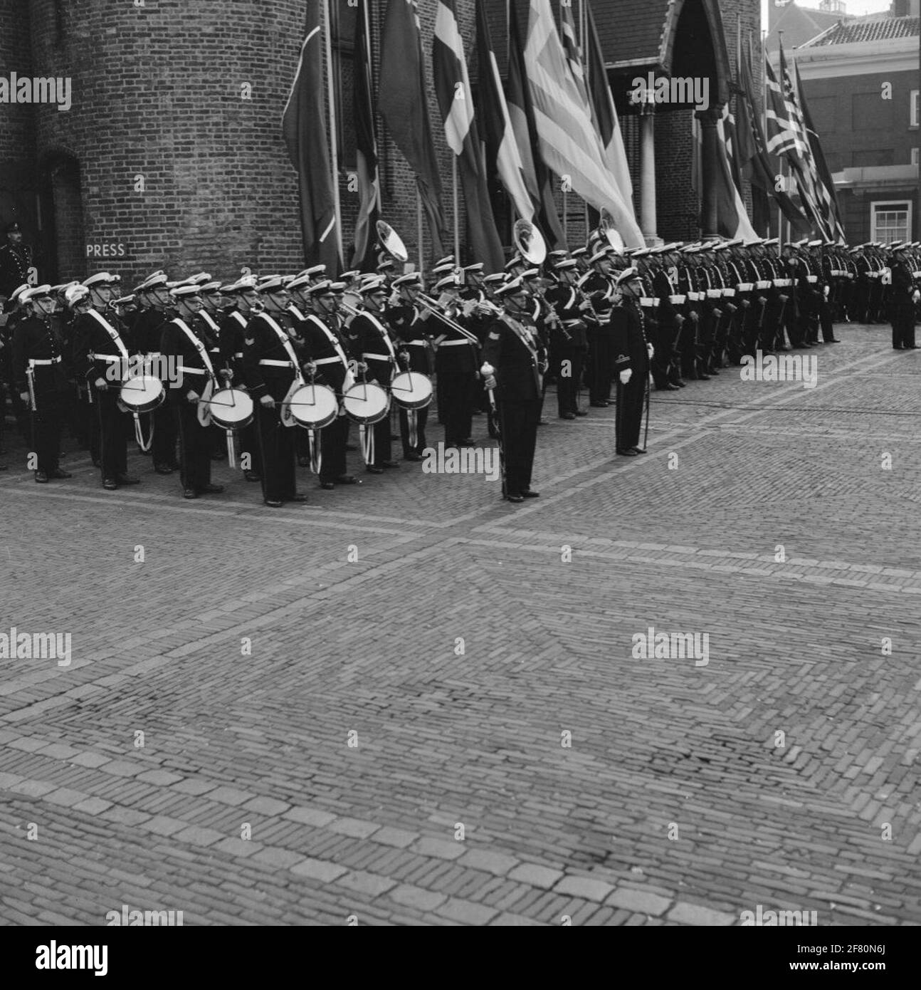 At the opening of a NATO conference, the honorary guard will be formed by the Marines Korps on the Binnenhof in The Hague. Soldier assistance upon arrival of an invited. Stock Photo