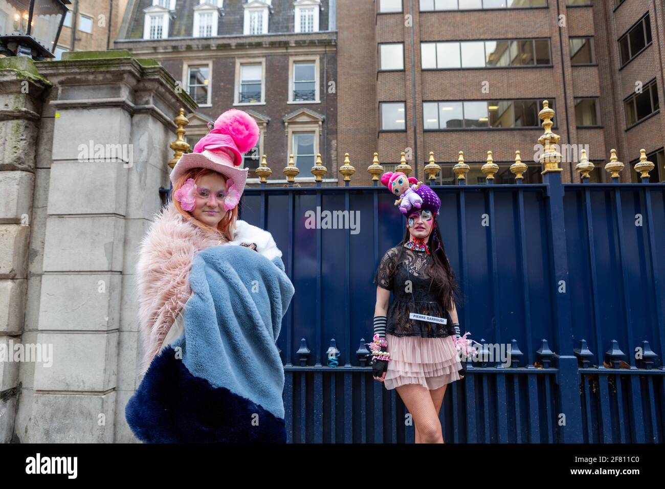 Models showcase Pierre Garroudi's latest colourful collection at one of the designer's specialty flash mob fashion shows in Central London. Stock Photo