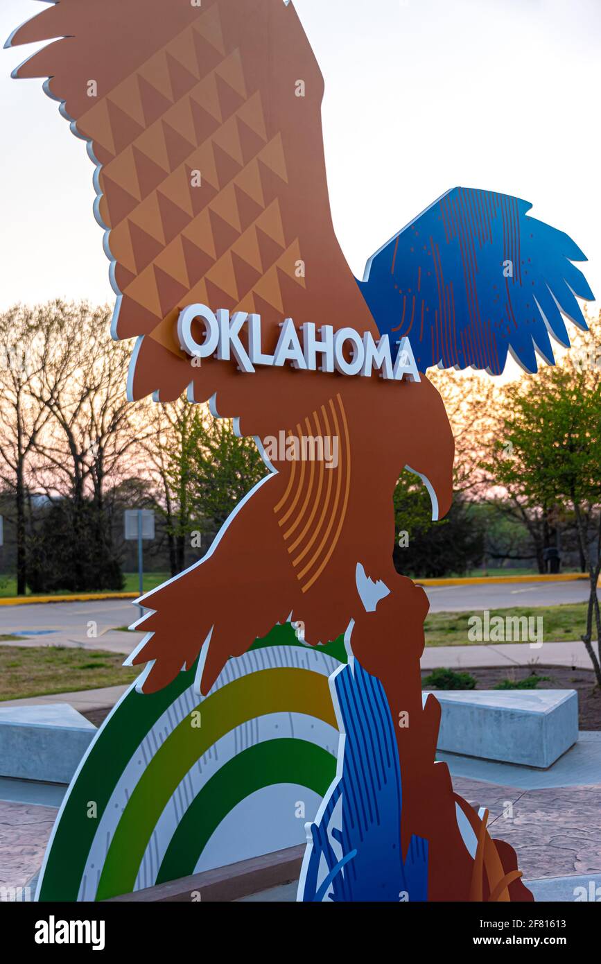 Oklahoma graphic sculpture at the Oklahoma Tourism Information Center along I-40 at Sallisaw in Sequoyah County, Oklahoma at sunset. (USA) Stock Photo