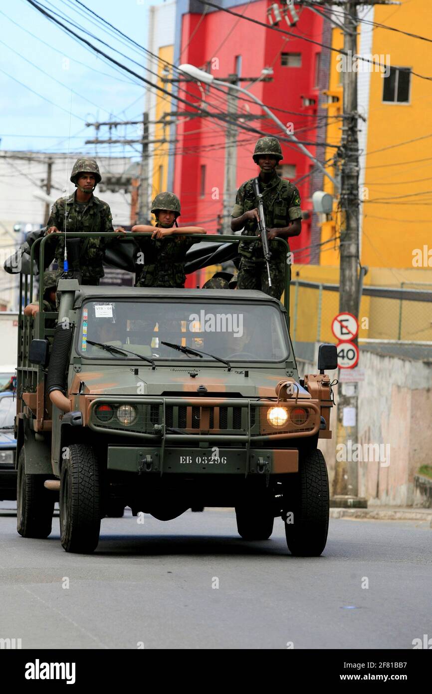 salvador, bahia / brazil  - april 23, 2014: Army military patrols in Salvador's Sussuarana neighborhood during military police strike. *** Local Capti Stock Photo