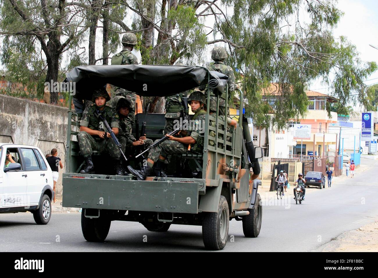 salvador, bahia / brazil  - april 23, 2014: Army military patrols in Salvador's Sussuarana neighborhood during military police strike. *** Local Capti Stock Photo