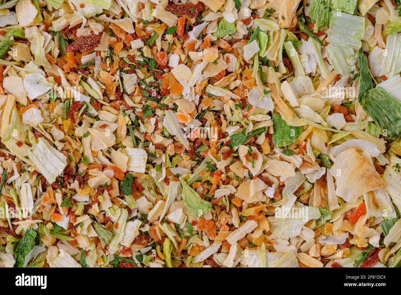 Dry vegetables background of carrot, celery and onion. Stock Photo