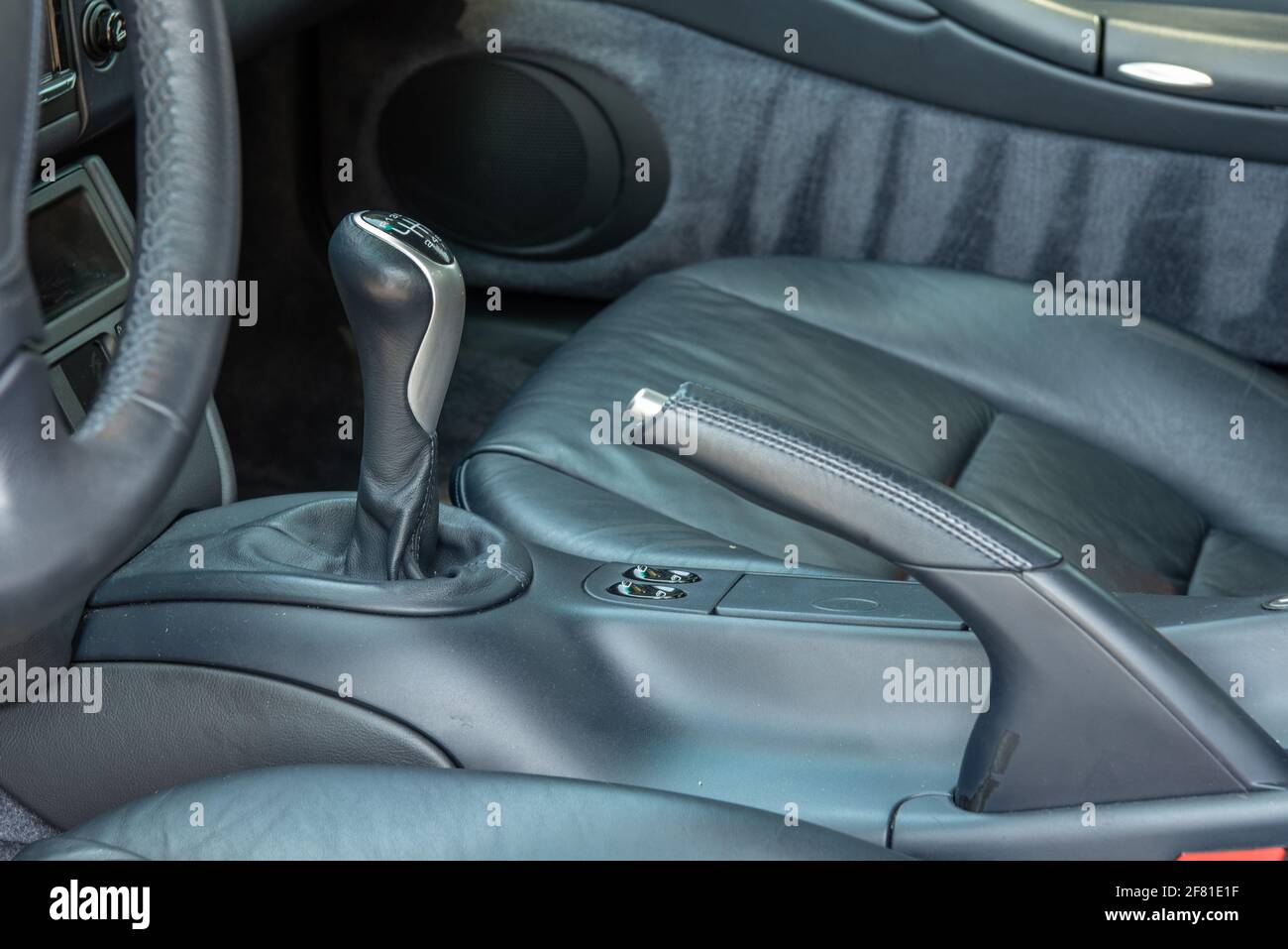 Sports car stick shift 6 speed lever located in center console of