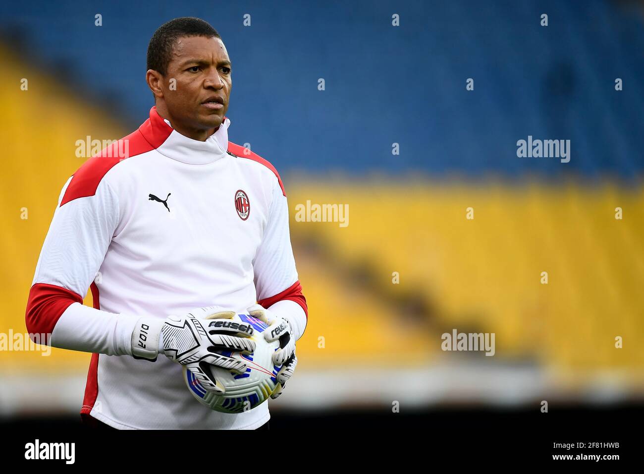 Parma, Italy - 10 April, 2021: Dida (Nelson de Jesus Silva), goalkeeping coach of AC Milan, holds a ball during warm up prior to the Serie A football match between Parma Calcio and AC Milan. AC Milan won 3-1 over Parma Calcio. Credit: Nicolò Campo/Alamy Live News Stock Photo