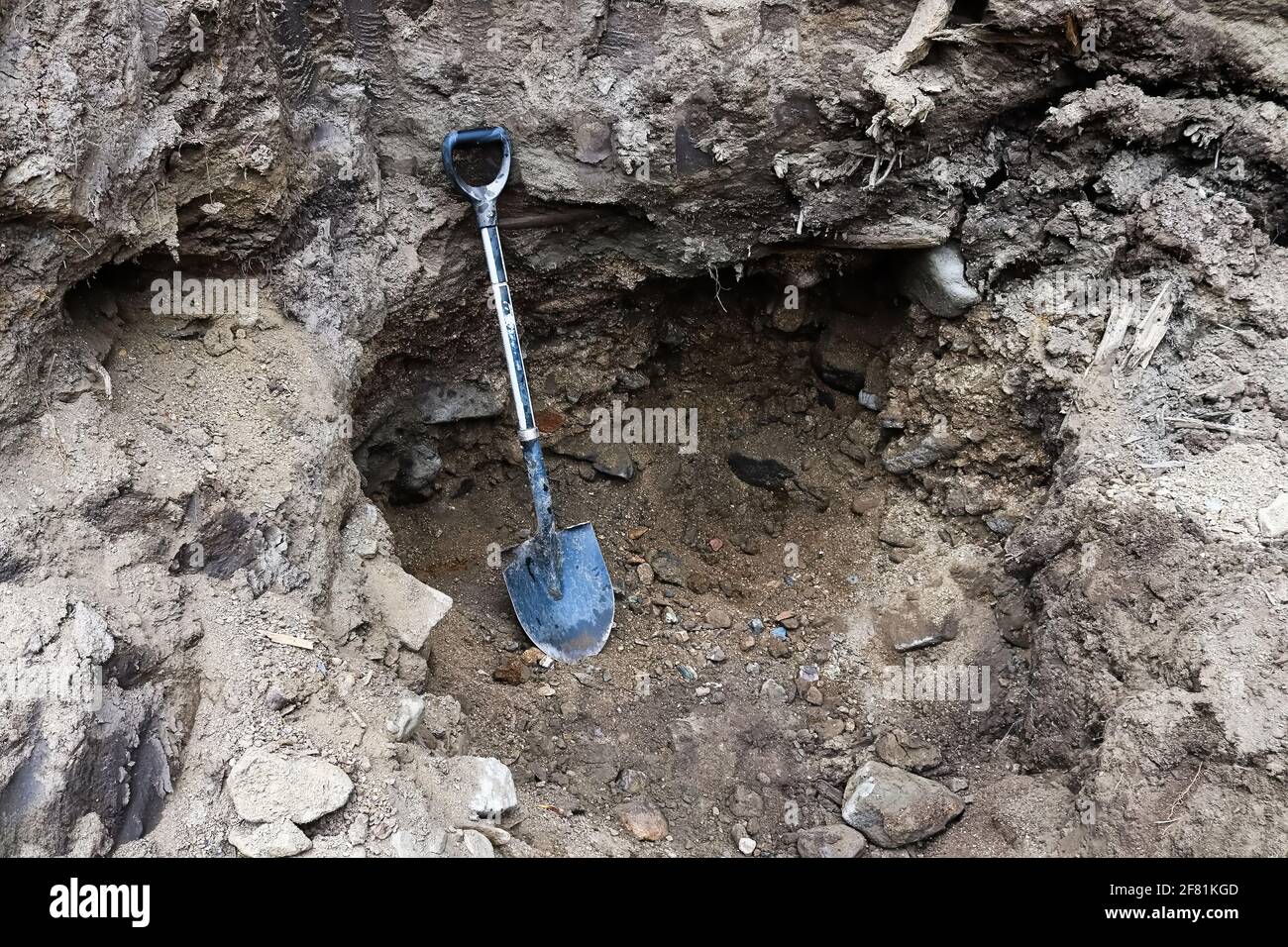 Digging in rich gold laiden gravel hole Stock Photo Alamy