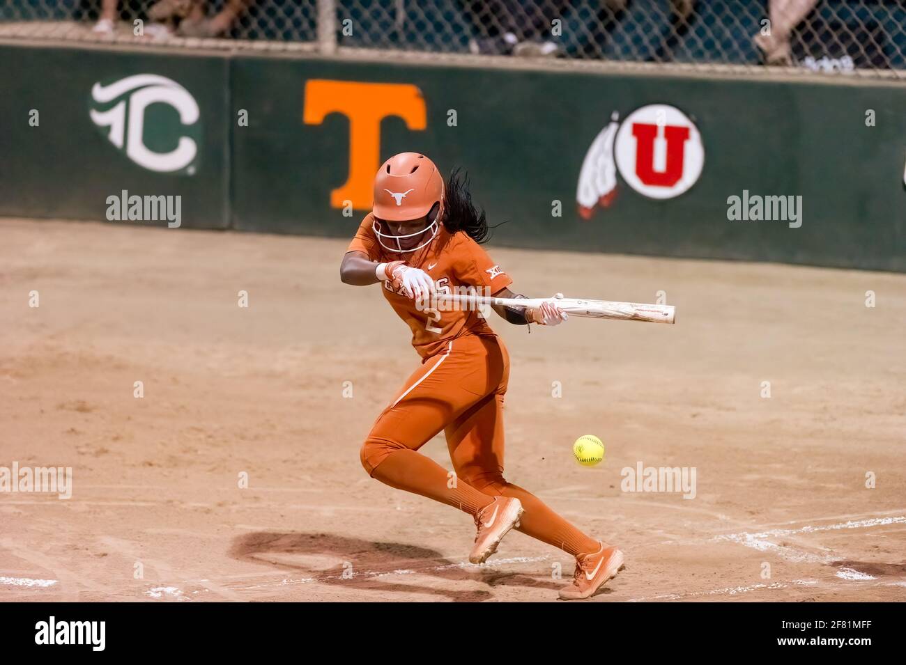 A Texas Longhorn Player Is Batting Against The Ole Miss Rebels At The