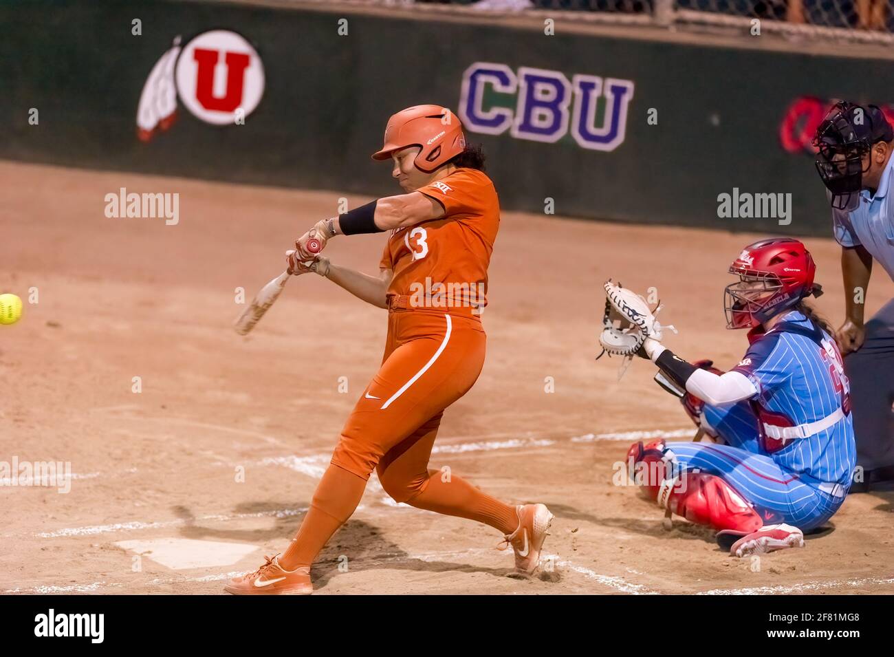 A Texas Longhorn Player Is Batting Against The Ole Miss Rebels At The