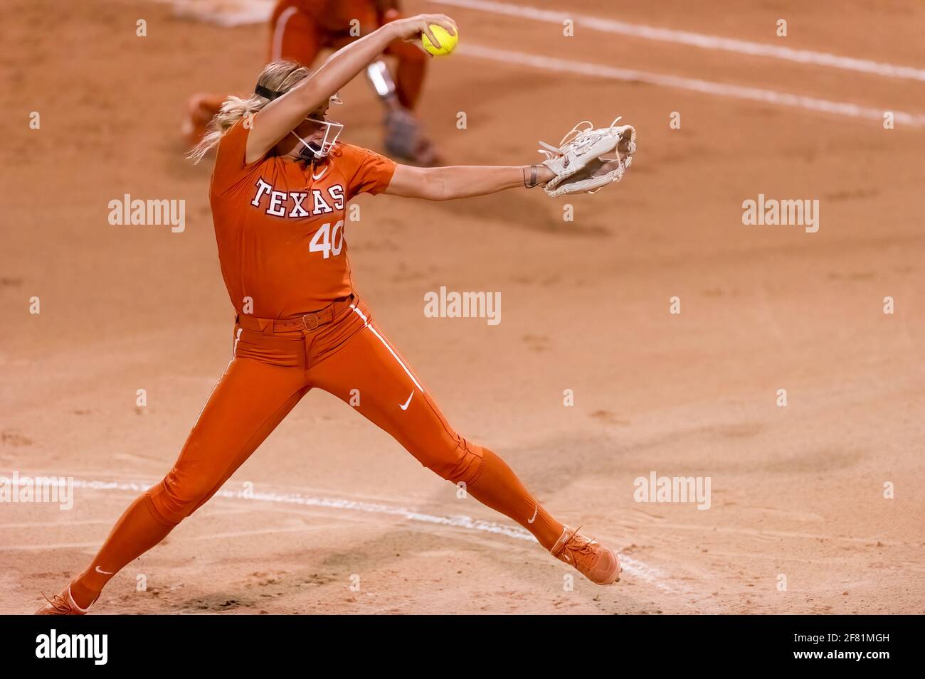 Texas Longhorn Pitcher Miranda Elish Is Winding Up For a Pitch to Plate Stock Photo