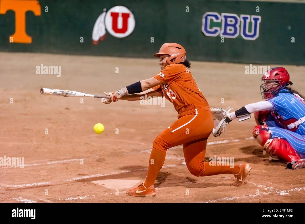 A Texas Longhorn Player Is Batting Against The Ole Miss Rebels At The